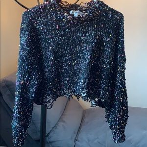 Distressed rainbow Pom Pom knit sweater